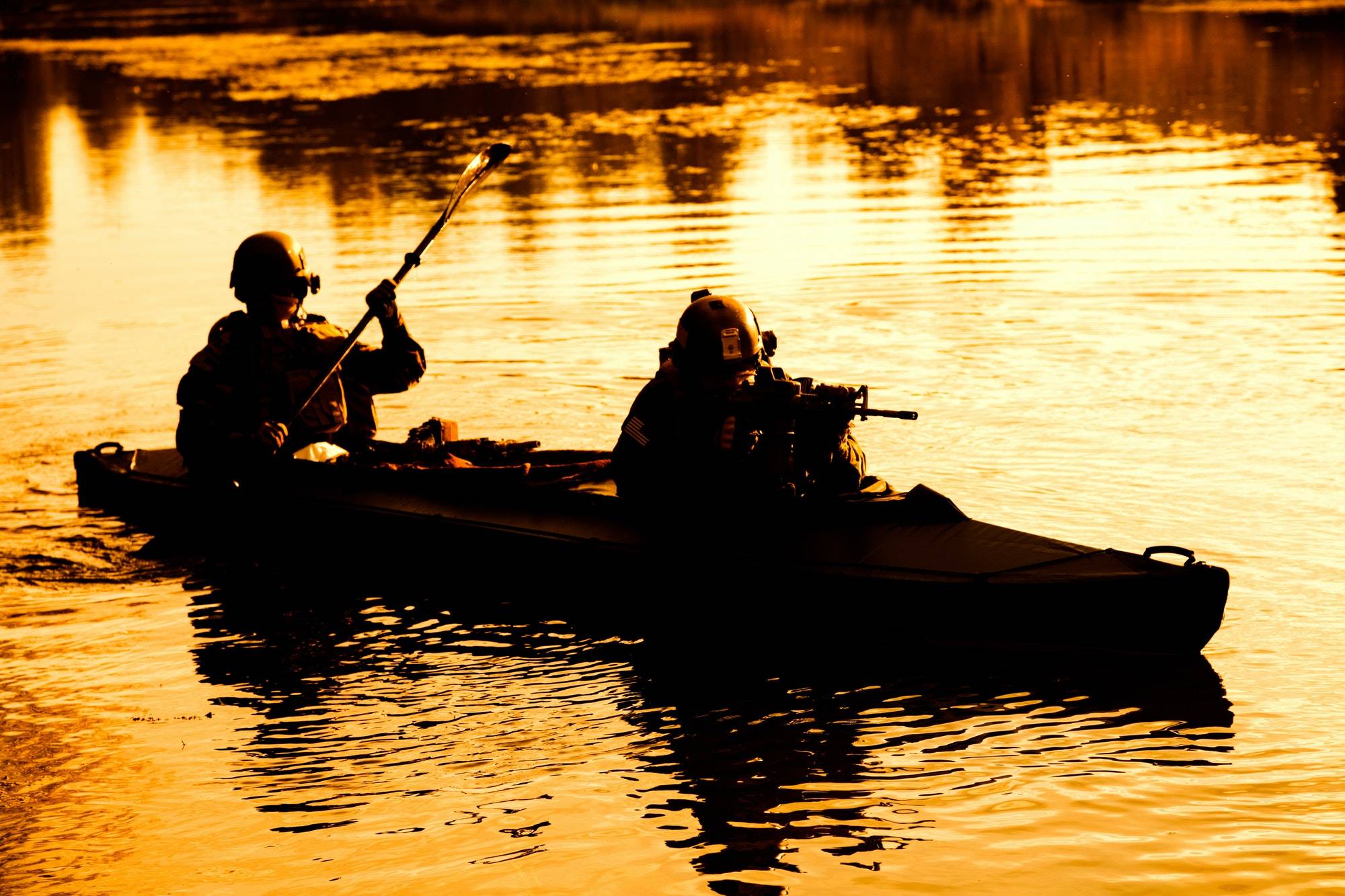 Militants in army kayak